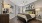 a bedroom with a bed and lamps