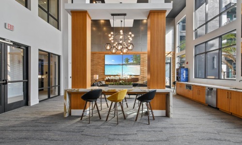 a room with a table and chairs