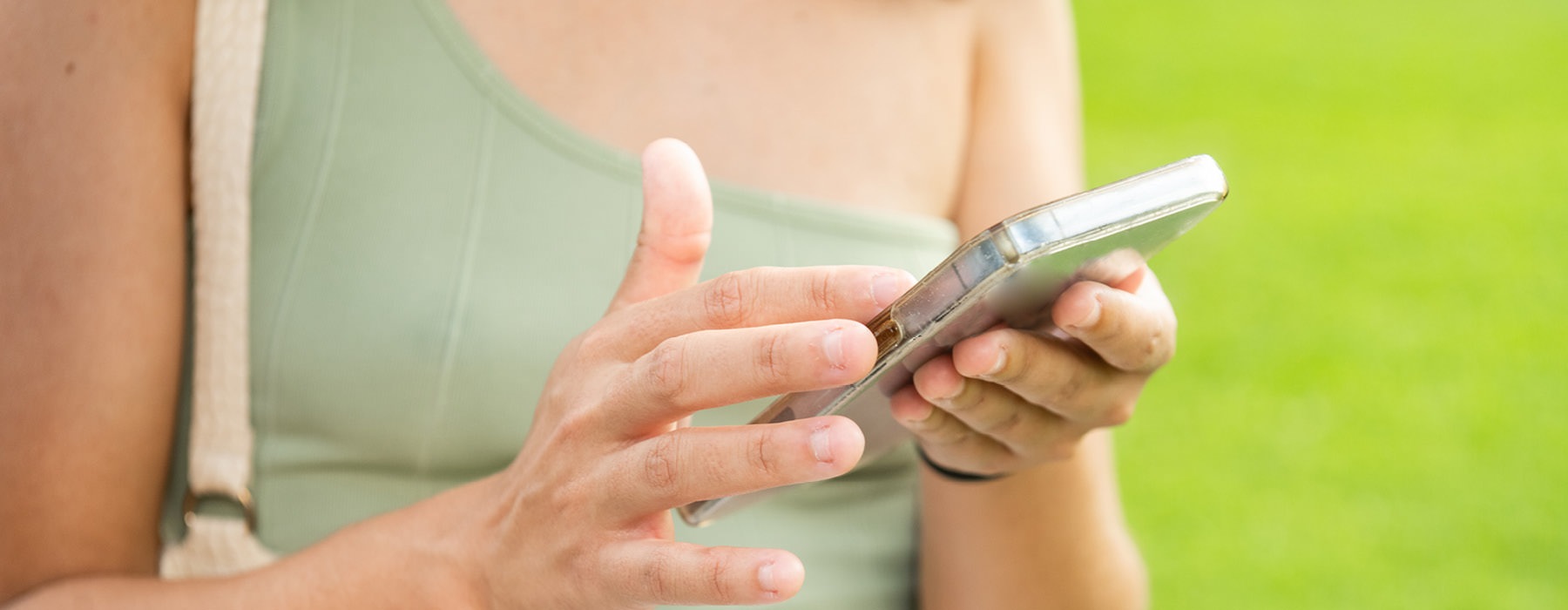 a woman holding a phone